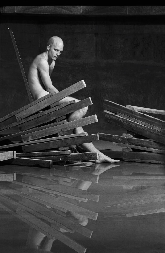 Construction Nudes Print: Steve Seated on Pallets