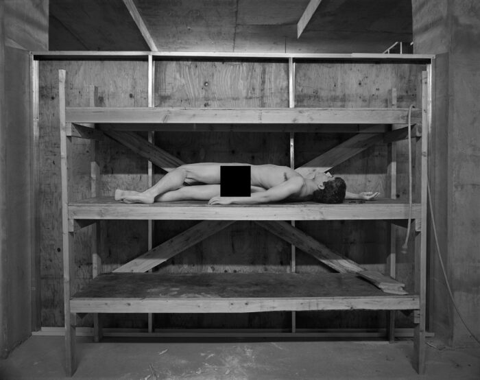 Construction Nudes Print: Armando Reclining on Plywood Shelves